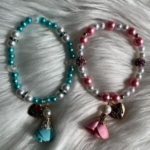 Teal and Pink Beaded Bracelets with Charms